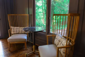 The inviting lobby of the inn at the summit, with a charming ambiance and picturesque mountain views.