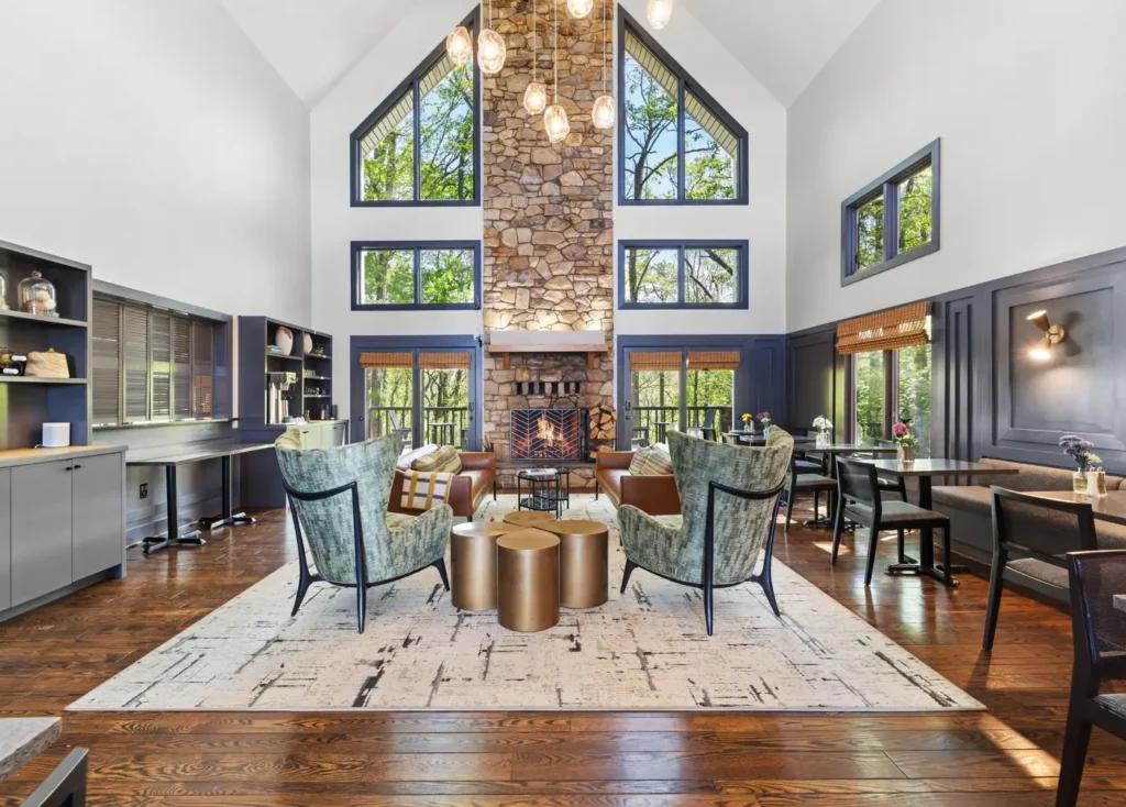 Living room with windows and  fireplace.