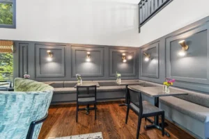 dining area with wooden furniture and soft lighting.