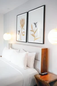 bedroom with a wooden headboard.