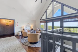 room with large windows and contemporary decor.