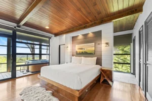 Bedroom with wooden ceiling.