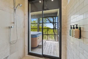 A room with a glass door.