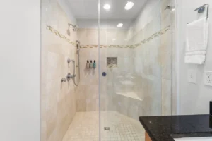 Hawk’s Nest Bathroom with glass-enclosed shower.