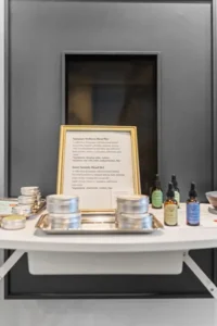 Wellness blend tin containers and essential oil bottles.