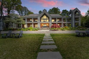 Luxury house exterior at sunset with pathway