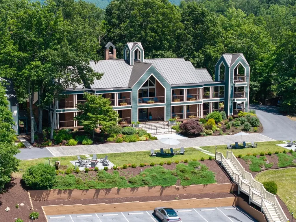 Front exterior of Iris Inn featuring landscaped grounds and mountain views in the Shenandoah Valley.